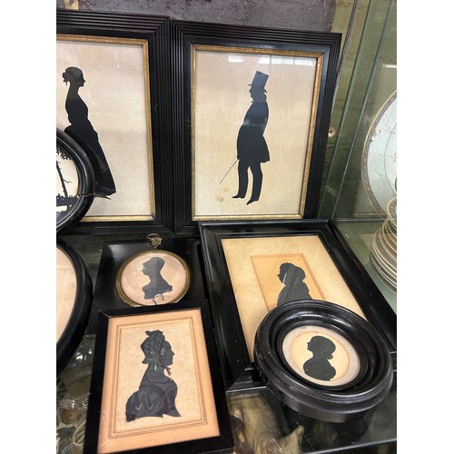 379 - SHELF OF 19TH CENTURY AND LATER SILHOUETTES FRAMED AND GLAZED