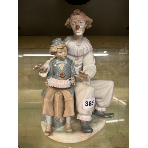 385 - NAO SEATED CLOWN AND CONCERTINA FIGURE GROUP