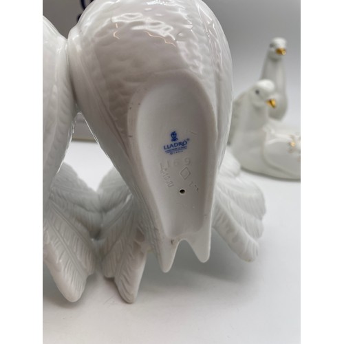 421 - LLADRO PEACE DOVES WITH BOX AND TWO VALENCIA DOVE FIGURES