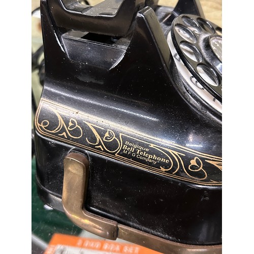 394 - OLD STYLE BLACK AND GILT RING DIAL TELEPHONE