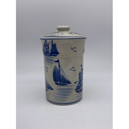 447 - THREE 209TH CENTURY CRACKLE GLAZED BLUE AND WHITE JARS AND COVERS