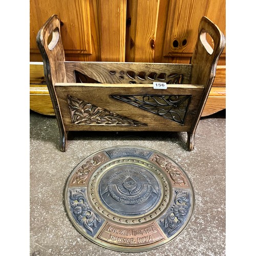 156 - CARVED WOODEN MAGAZINE RACK AND METAL WORK PLAQUE