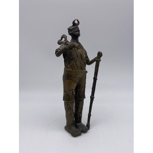 463 - TWO AFRICAN BRONZE FIGURES OF FARMERS