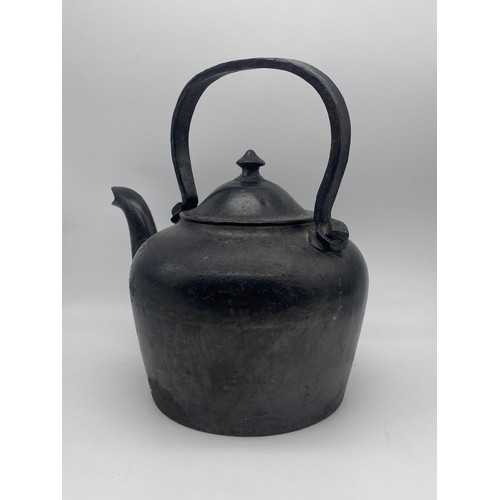 404 - 19TH CENTURY BLACK ENAMELLED CAST KETTLE