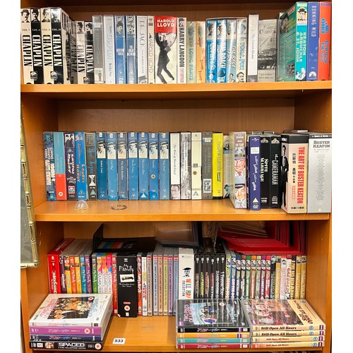 533 - THREE SHELVES OF COMEDY VHS FILMS, DVD BOXSETS OF SILENT MOVIES, BUSTER KEATON, HAROLD LLOYD, CHAPLI... 