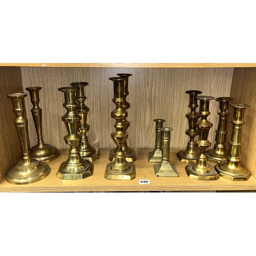 540 - SIX PAIRS OF VARIOUS STYLE BRASS CANDLE STICKS