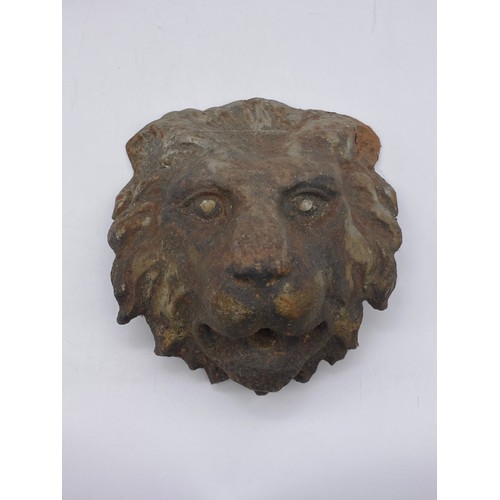 475 - PAIR OF CAST IRON LION FACE MASKS