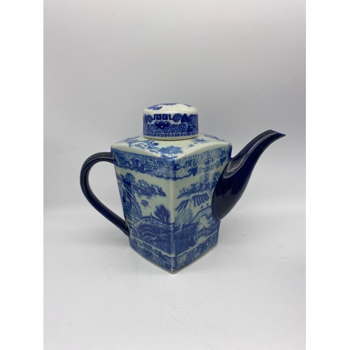 451 - RINGTONS BLUE AND WHITE WILLOWWARE TEAPOT AND TEA CANISTER