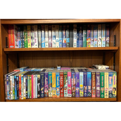 529 - FOUR SHELVES OF VHS FORMAT WALT DISNEY FEATURE FILMS, CINE CLUB, THE MUPPETS, LOONEY TUNES, DISNEY D... 