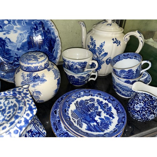 416 - ASSORTED 19TH CENTURY AND LATER BLUE AND WHITE PRINTED MEAT PATES, CUPS AND SAUCERS AND JUGS