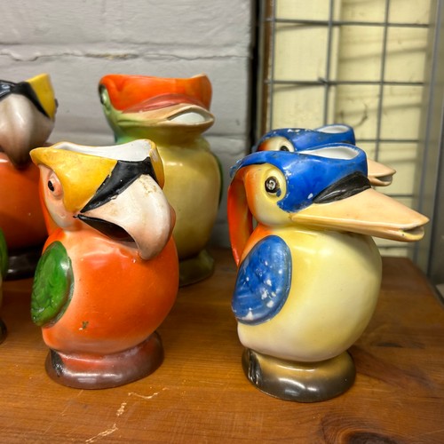 488 - SELECTION OF GERMAN WOOD PECKER AND PARAKEET DECORATIVE JUGS