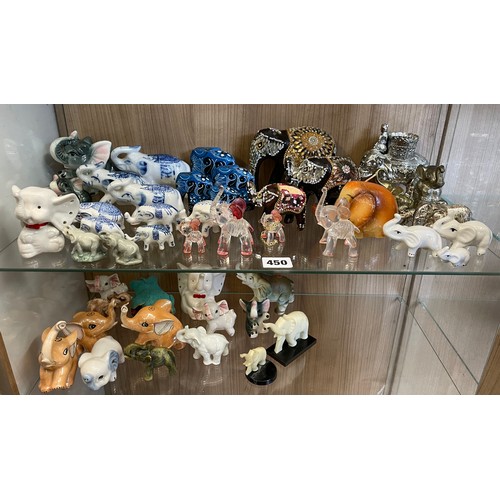 450 - TWO SHELVES OF VARIOUS POTTERY, GLASS AND METAL ELEPHANT FIGURES