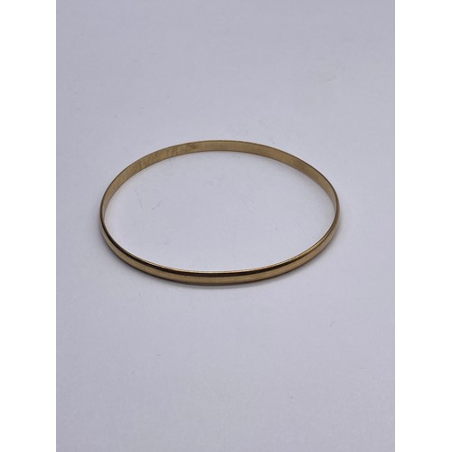 707 - 9CT GOLD PLAIN BANGLE 9G APPROX