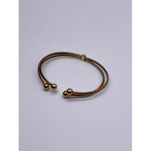 706 - 9CT DOUBLE BANGLE WITH BALL FINIALS 8G APPROX