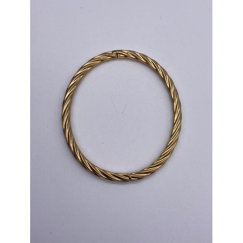 703 - 9CT GOLD HOLLOW ROPE TWIST BANGLE 6G APPROX