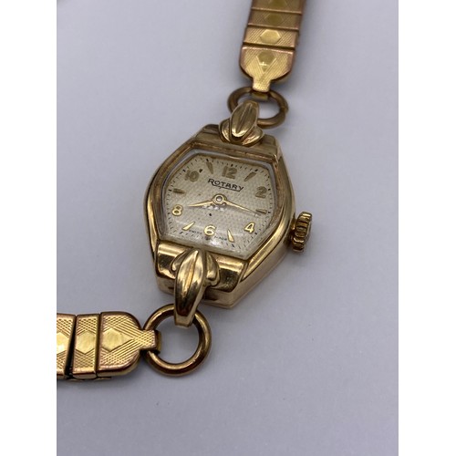 692 - 9CT GOLD ROTARY LADIES WRISTWATCH ON PLATED EXPANDING STRAP 15G OVERALL APPROX