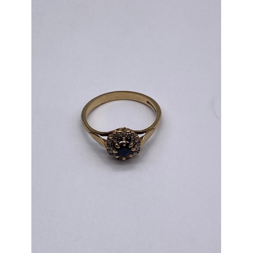 690 - 9CT GOLD SAPPHIRE CZ CLUSTER RING SIZE N 2G APPROX