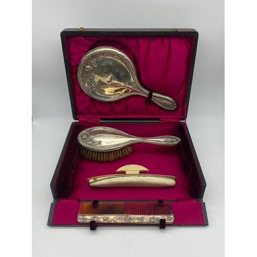 689 - VANITY BOX CONTAINING SILVER BACKED HAND MIRROR, BRUSH AND COMB A/F