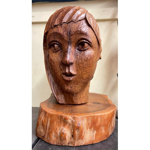 413 - CARVED SCULPTURE BUST OF A FEMALE ON LOG, PLINTH DATED 67