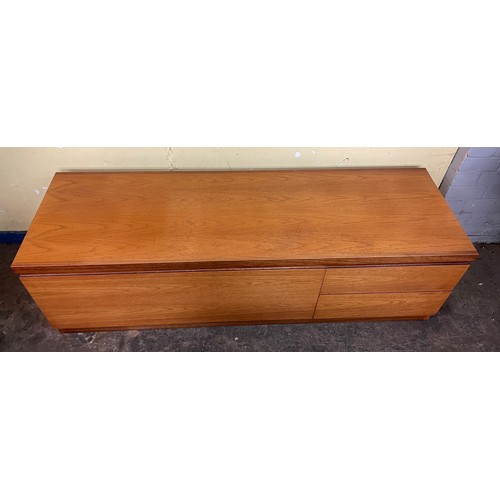 136 - TEAK LOW SIDEBOARD FITTED WITH FALL FLAP AND TWO DRAWERS