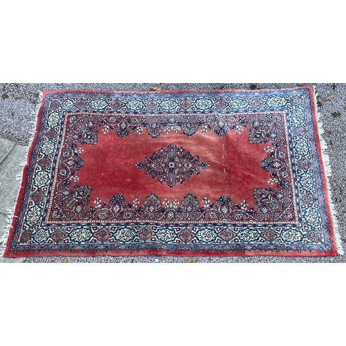 191 - LARGE GEOMETRIC RED PATTERNED RUG