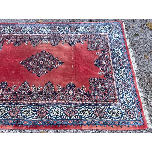 191 - LARGE GEOMETRIC RED PATTERNED RUG