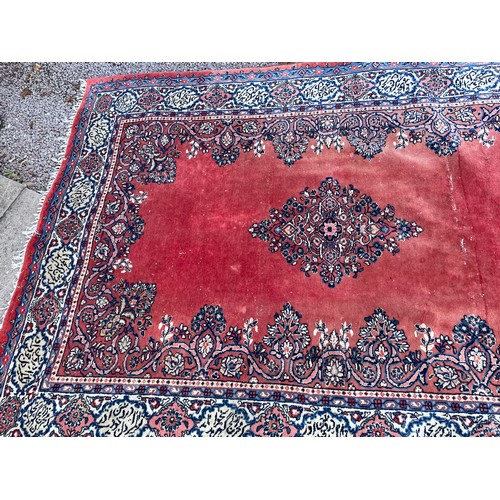 191 - LARGE GEOMETRIC RED PATTERNED RUG