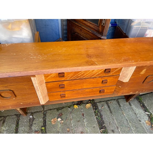 139 - DISTRESSED 1960S/70S TEAK LONG SIDEBOARD (VENEERS LIFTED)