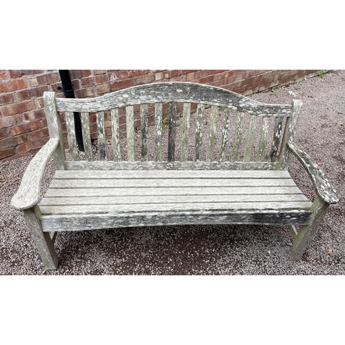 143 - TWO WEATHERED SLATTED GARDEN BENCHES A/F