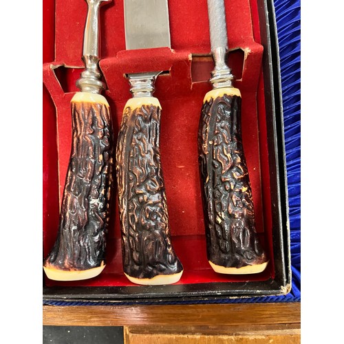 247 - OAK CASED BOX OF THREE PIECE CARVING SET AND HORN HANDLED EFFECT CARVING SET AND MINI GUILOTINE