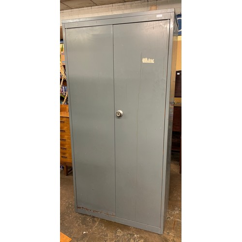 89 - METAL UPRIGHT TWO DOOR STATIONARY CUPBOARD