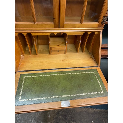 69 - PINE ASTRAGAL GLAZED BUREAU BOOKCASE WITH GREEN LEATHER BACKED FALL FLAP