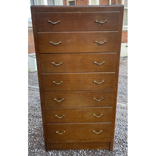 64 - 1960S OAK PLY SEVEN DRAWER CHEST