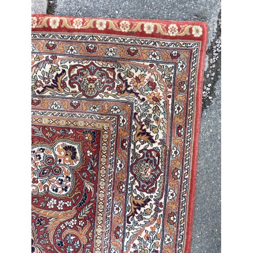 53 - RUSSETT GROUND FLORAL PATTERN CARPET 8FT X 11FT