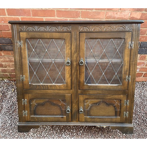 39 - OAK LEADED GLAZED DWARF CABINET