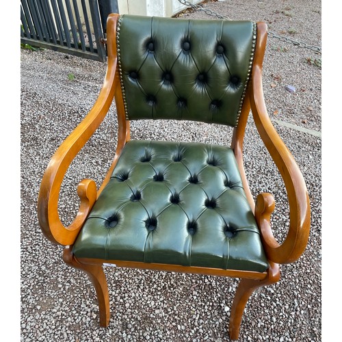 50 - BOTTLE GREEN BUTTON LEATHER SABRE LEG ELBOW CHAIR