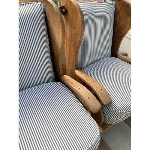 129 - RUSTIC ELM WING BACK CHAIRS WITH STRIPED PADDED CUSHIONS