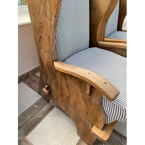 129 - RUSTIC ELM WING BACK CHAIRS WITH STRIPED PADDED CUSHIONS