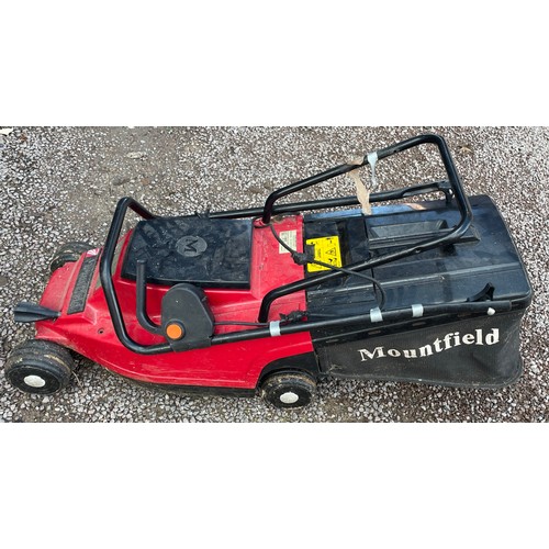 134A - RED MOUNTFIELD LAWNMOWER