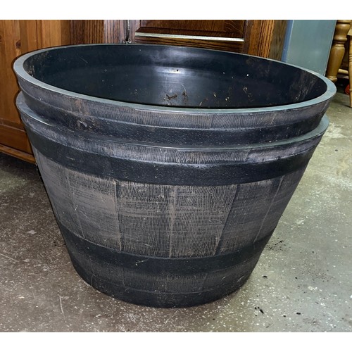 62 - LARGER PAIR OF BARRELL EFFECT TUB PLANTERS