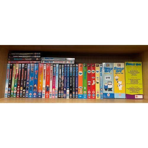 316 - SHELF OF FAMILY GUY AND AMERICAN DVD AND VHS BOX SETS