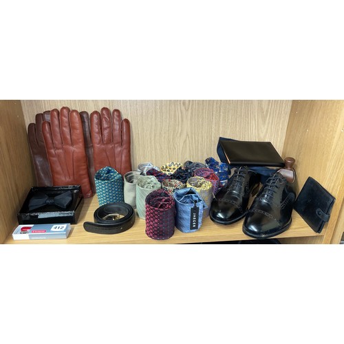 412 - SHELF OF GENTS TIES, LEATHER GLOVES, AND A PAIR OF CHURCHES LEATHER SHOES SIZE 75