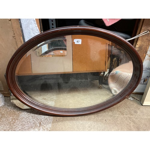 52 - MAHOGANY OVAL FRAMED MIRROR