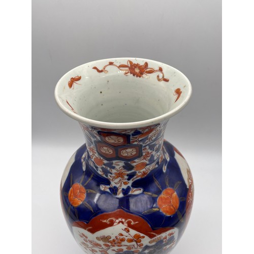 440 - JAPANESE IMARI PATTERNED VASE DECORATED WITH BIRDS AMIDST FOLIAGE AND INTERIOR SCENES