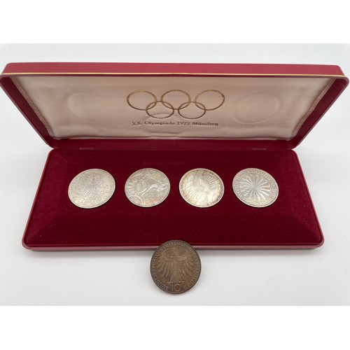 474 - CASED SET OF FOUR 1972 MUNICH OLYMPIC COINS AND ONE OTHER