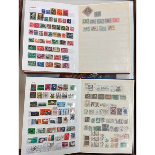 559 - 8 FOLDERS OF STAMPS AND FIRST DAY A-Z, INCULDING GREAT BRITAN, SPAIN AND JAPAN