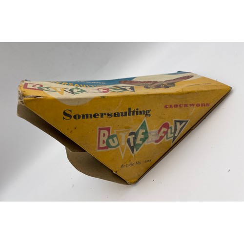 597 - BOXED SOMERSAULTING CLOCKWORK BUTTERFLY TOY NO.504