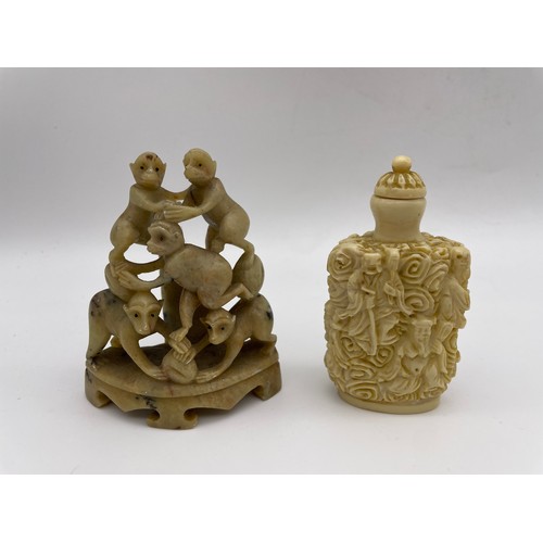 465 - CHINESE CARVED SOAPSTONE MONKEY TOWER AND RESIN IVORY EFFECT SNUFF BOTTLE