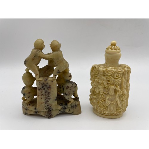 465 - CHINESE CARVED SOAPSTONE MONKEY TOWER AND RESIN IVORY EFFECT SNUFF BOTTLE