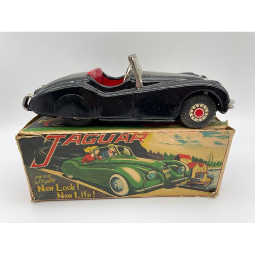 463 - VINTAGE JAGUAR SPORTS CAR TIN PLATE TOY